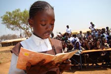 Girl reads out loud during International Literacy Day celebrations in Zambia 